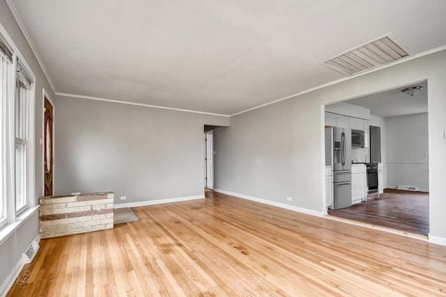 730 E 156th St, South Holland, IL 60473 - unfurnished living room with light wood-type flooring and ornamental molding