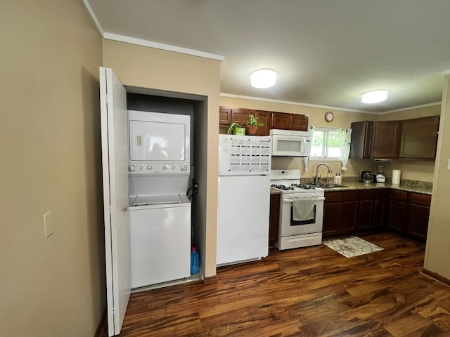 1313 Loral Ave, Joliet, IL 60435 - kitchen featuring white appliances, stacked washer / drying machine, ornamental molding, dark wood-style floors, and dark brown cabinetry