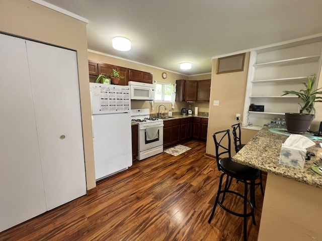 1313 Loral Ave, Joliet, IL 60435 - kitchen featuring white appliances, open shelves, dark wood-style flooring, ornamental molding, and light stone counters