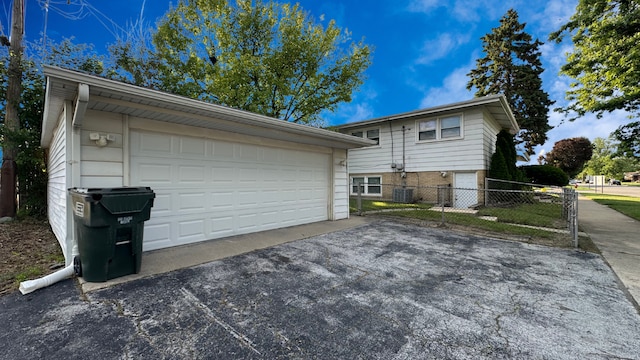 619 E 152nd St, Dolton, IL 60419 - back of property with a detached garage and an outbuilding