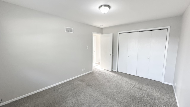 619 E 152nd St, Dolton, IL 60419 - unfurnished bedroom featuring carpet flooring and a closet