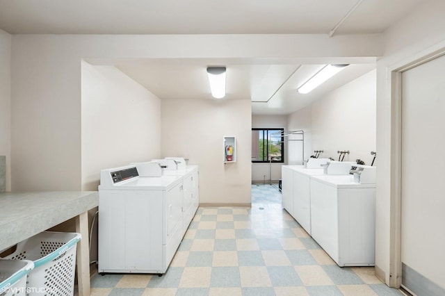 522 E Algonquin Rd Unit 309A, Schaumburg, IL 60173 - community laundry room featuring washer and dryer and light flooring