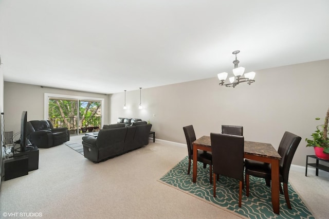 522 E Algonquin Rd Unit 309A, Schaumburg, IL 60173 - carpeted dining room with a chandelier and baseboards