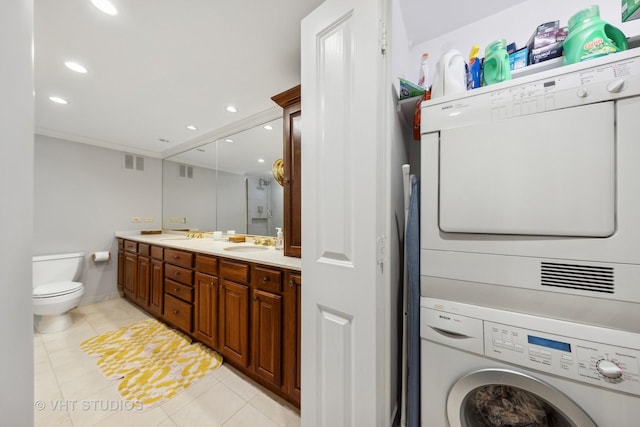 505 N Lake Shore Dr Unit 2110-11, Chicago, IL 60611 - laundry room with stacked washer / drying machine, light tile patterned floors, and recessed lighting