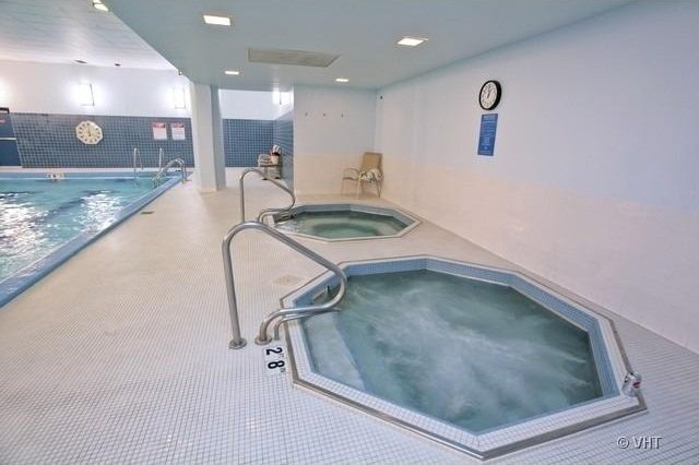 505 N Lake Shore Dr Unit 2110-11, Chicago, IL 60611 - indoor community pool with an in-ground hot tub