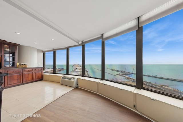 505 N Lake Shore Dr Unit 2110-11, Chicago, IL 60611 - unfurnished sunroom with a water view and a wall mounted air conditioner