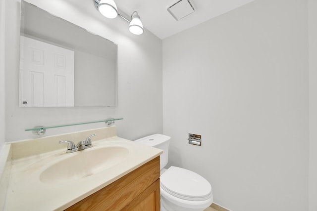 15 Harrison Ln, Streamwood, IL 60107 - half bathroom featuring toilet and vanity