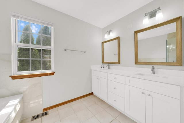 15 Harrison Ln, Streamwood, IL 60107 - bathroom with double vanity and a tub