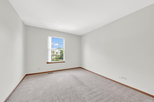 15 Harrison Ln, Streamwood, IL 60107 - unfurnished room with carpet flooring and baseboards