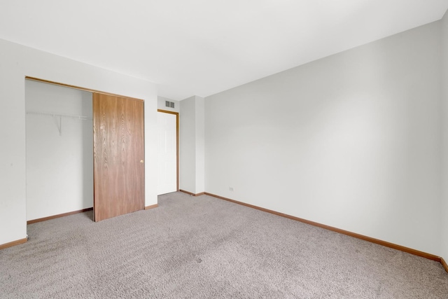 15 Harrison Ln, Streamwood, IL 60107 - unfurnished bedroom with carpet flooring and a closet