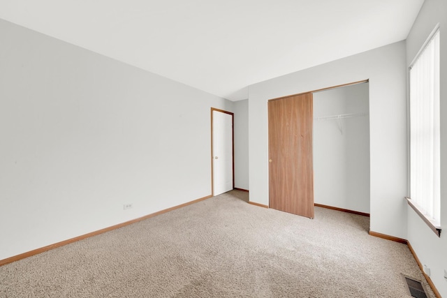 15 Harrison Ln, Streamwood, IL 60107 - unfurnished bedroom with carpet flooring and a closet