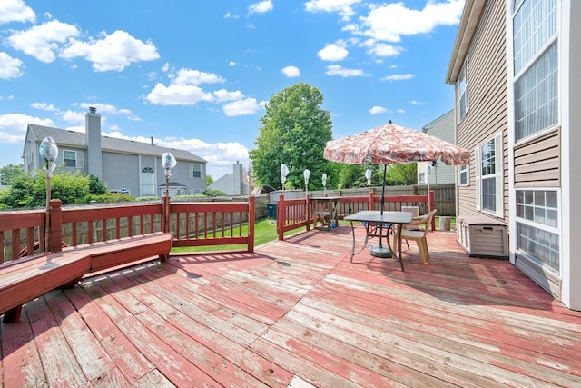15 Harrison Ln, Streamwood, IL 60107 - deck featuring outdoor dining space and a fenced backyard