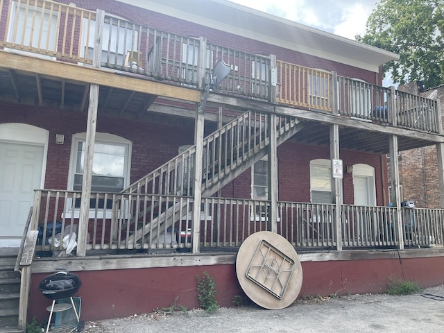 203 Union St, Joliet, IL 60433 - view of side of home with brick siding and stairway