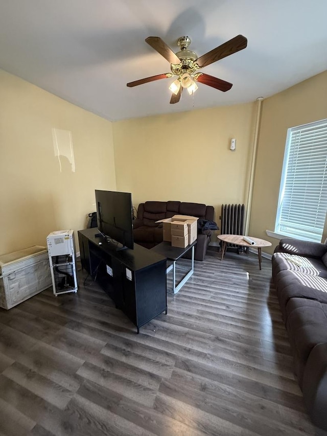 203 Union St, Joliet, IL 60433 - living room featuring wood finished floors, ceiling fan, and radiator heating unit