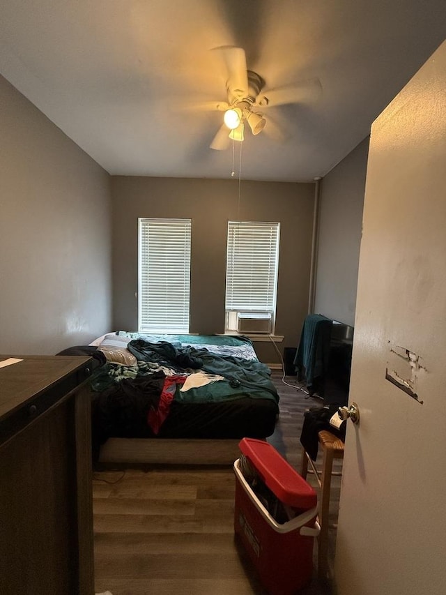 203 Union St, Joliet, IL 60433 - bedroom with wood finished floors, a ceiling fan, and cooling unit