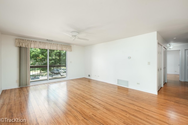 7515 Nantucket Dr Unit 202, Darien, IL 60561 - spare room featuring ceiling fan and light wood-type flooring
