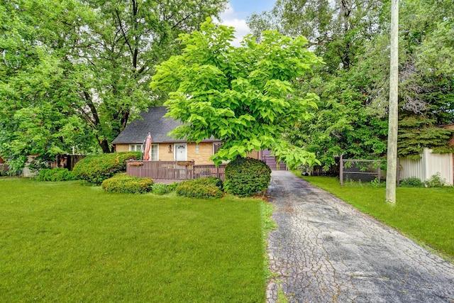 7912 S 85th Ave, Justice, IL 60458 - view of front of property featuring asphalt driveway, brick siding, and roof with shingles