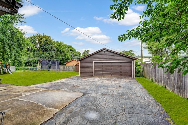 7912 S 85th Ave, Justice, IL 60458 - detached garage featuring a trampoline