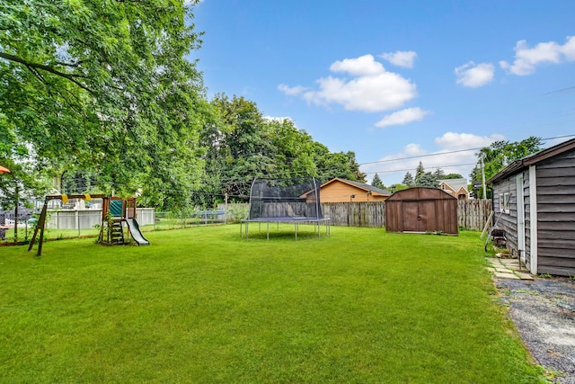 7912 S 85th Ave, Justice, IL 60458 - fenced backyard featuring a trampoline, a storage shed, and a playground