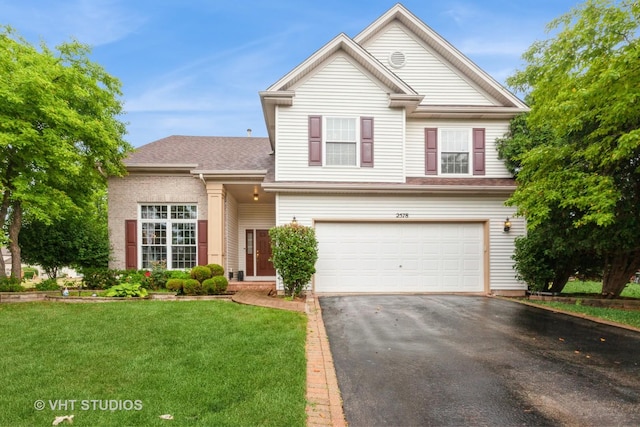 2578 Crestview Dr, Aurora, IL 60502 - view of front of home with an attached garage, driveway, a front yard, and a shingled roof