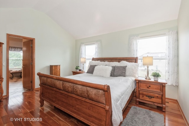2578 Crestview Dr, Aurora, IL 60502 - bedroom featuring wood finished floors, lofted ceiling, and multiple windows