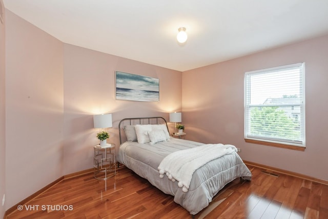 2578 Crestview Dr, Aurora, IL 60502 - bedroom featuring baseboards and wood finished floors