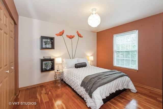 2578 Crestview Dr, Aurora, IL 60502 - bedroom with hardwood / wood-style flooring and a closet