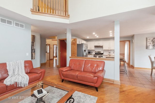 2578 Crestview Dr, Aurora, IL 60502 - living room featuring recessed lighting and light wood-style floors