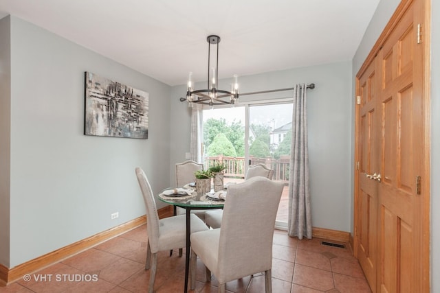 2578 Crestview Dr, Aurora, IL 60502 - dining room featuring a chandelier and light tile patterned floors