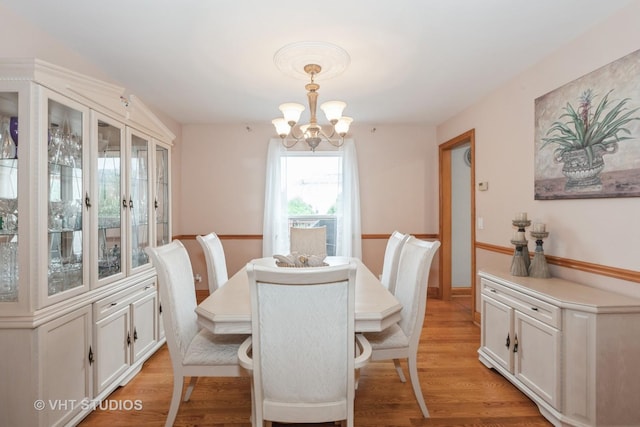 2578 Crestview Dr, Aurora, IL 60502 - dining space with a chandelier and light wood finished floors