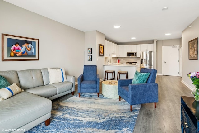 1101 S State St Unit 2202, Chicago, IL 60605 - living area with wood finished floors and recessed lighting