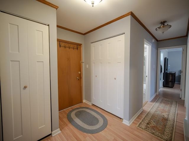 10109 S Cicero Ave Unit 302, Oak Lawn, IL 60453 - foyer entrance with light wood-type flooring and ornamental molding