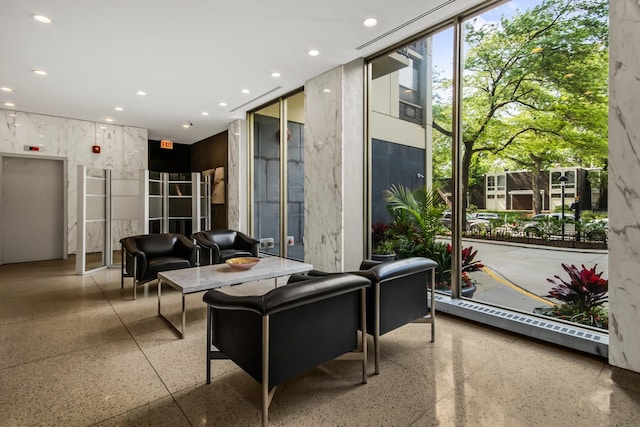 1360 N Sandburg Ter Unit 703C, Chicago, IL 60610 - lobby with a wall of windows and recessed lighting