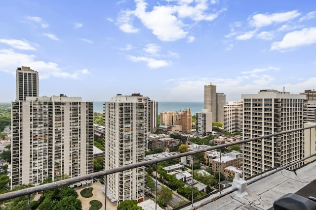 1360 N Sandburg Ter Unit 703C, Chicago, IL 60610 - balcony featuring a city view and a water view
