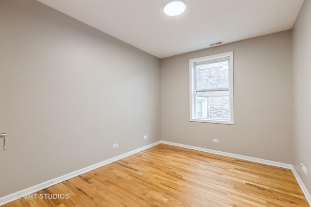3115 W Lexington St, Chicago, IL 60612 - empty room with baseboards and light wood finished floors