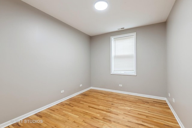 3115 W Lexington St, Chicago, IL 60612 - empty room featuring light wood-type flooring and baseboards