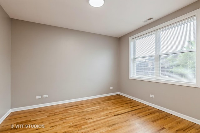 3115 W Lexington St, Chicago, IL 60612 - empty room with baseboards and light wood finished floors