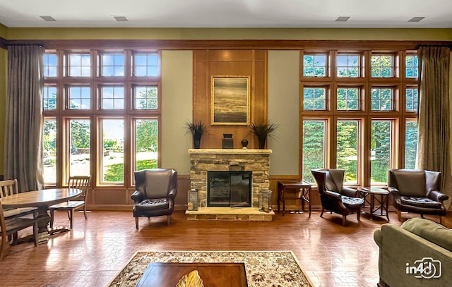 614 Pineridge Dr N Unit 614, Oswego, IL 60543 - living area featuring a fireplace
