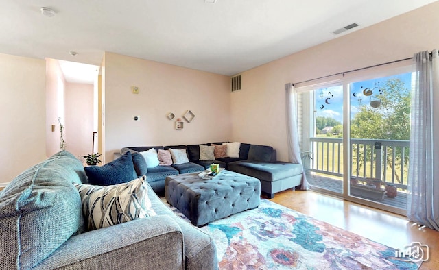 614 Pineridge Dr N Unit 614, Oswego, IL 60543 - living room featuring wood finished floors