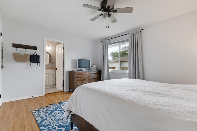 1669 W Bayside Ct, Hoffman Estates, IL 60192 - bedroom with light wood-type flooring, connected bathroom, and ceiling fan