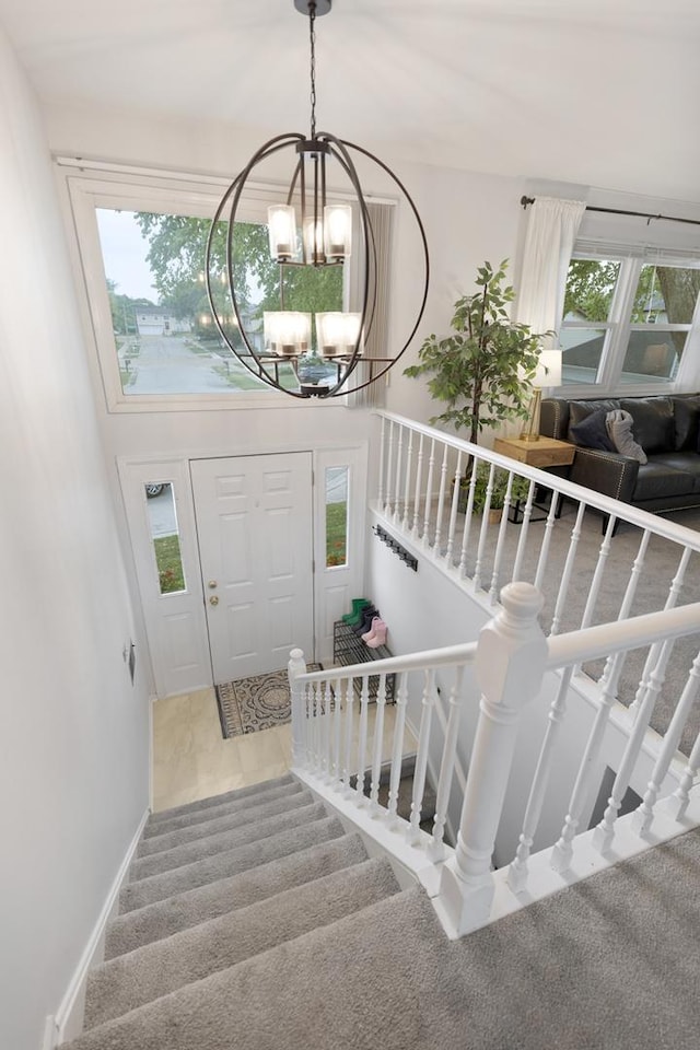 1669 W Bayside Ct, Hoffman Estates, IL 60192 - stairs featuring a chandelier