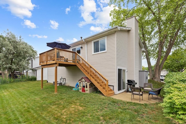 1669 W Bayside Ct, Hoffman Estates, IL 60192 - back of property with a wooden deck, a chimney, stairway, and a patio area