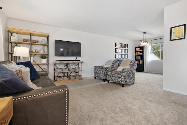 1669 W Bayside Ct, Hoffman Estates, IL 60192 - carpeted living room with a chandelier and baseboards