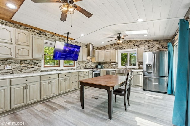 30 Aspen Ln, Wilmington, IL 60481 - kitchen featuring appliances with stainless steel finishes, ceiling fan, wood ceiling, lofted ceiling, and wall chimney exhaust hood