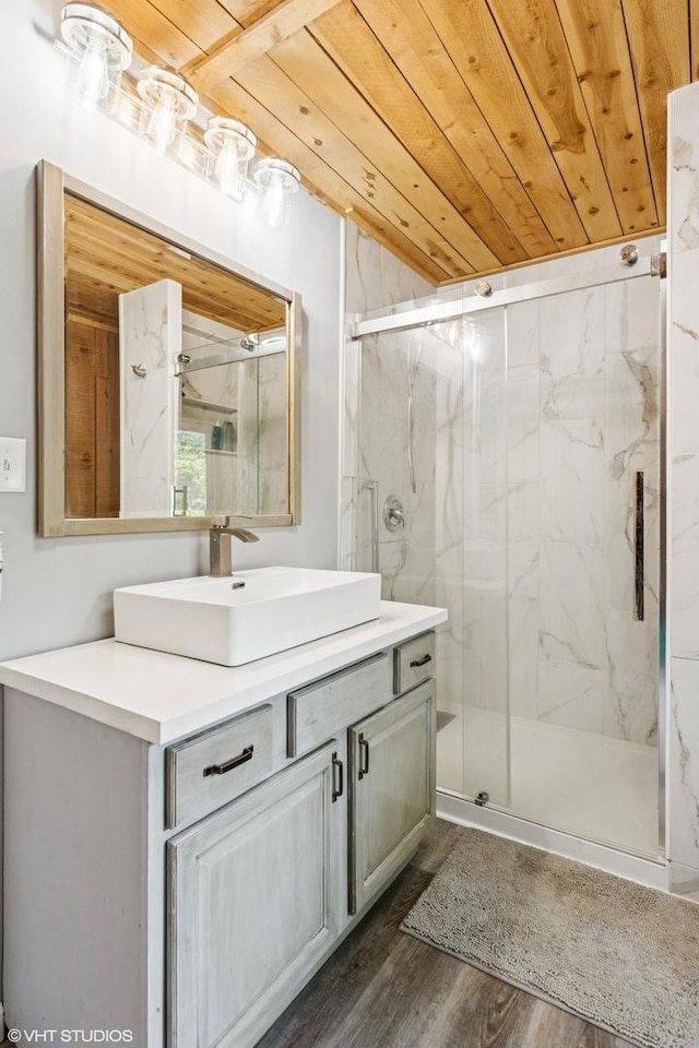 30 Aspen Ln, Wilmington, IL 60481 - full bathroom featuring a marble finish shower, vanity, wood finished floors, and wooden ceiling