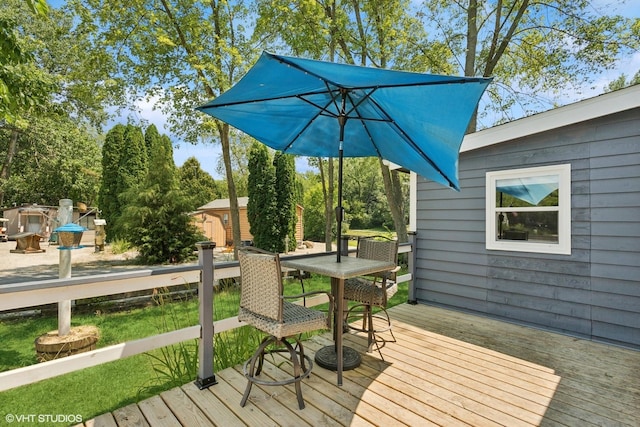 30 Aspen Ln, Wilmington, IL 60481 - deck featuring a shed and outdoor dining space