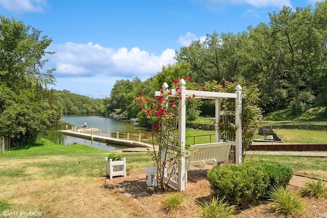 30 Aspen Ln, Wilmington, IL 60481 - view of green lawn featuring a boat dock and a water view