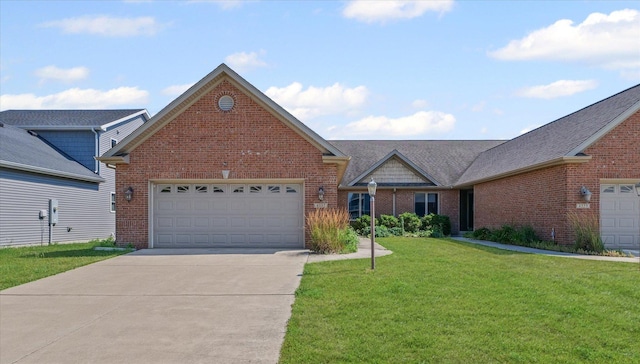 4537 Nicklaus Dr, Champaign, IL 61822 - view of front of property with brick siding, a front lawn, concrete driveway, and a garage