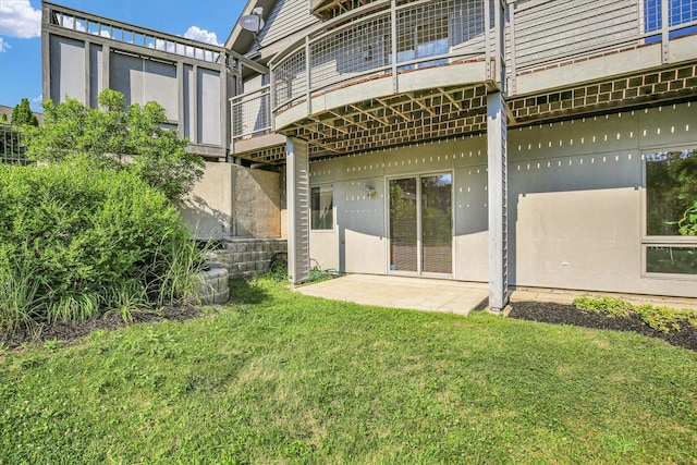 2405 Prairieridge Pl, Champaign, IL 61822 - rear view of house featuring a yard and a balcony