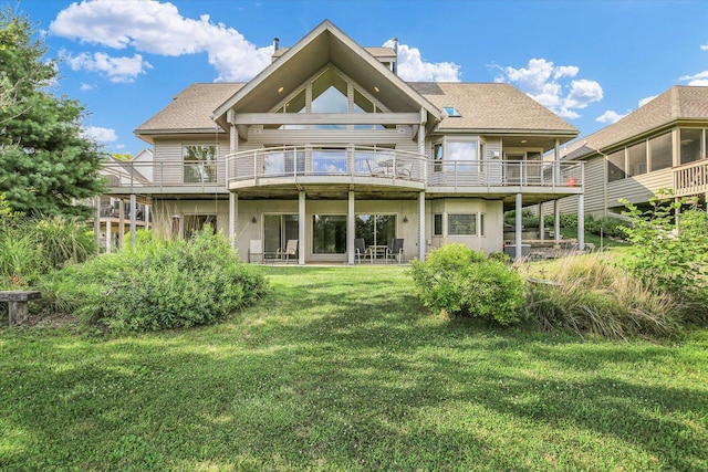 2405 Prairieridge Pl, Champaign, IL 61822 - rear view of property featuring a lawn, a balcony, and roof with shingles
